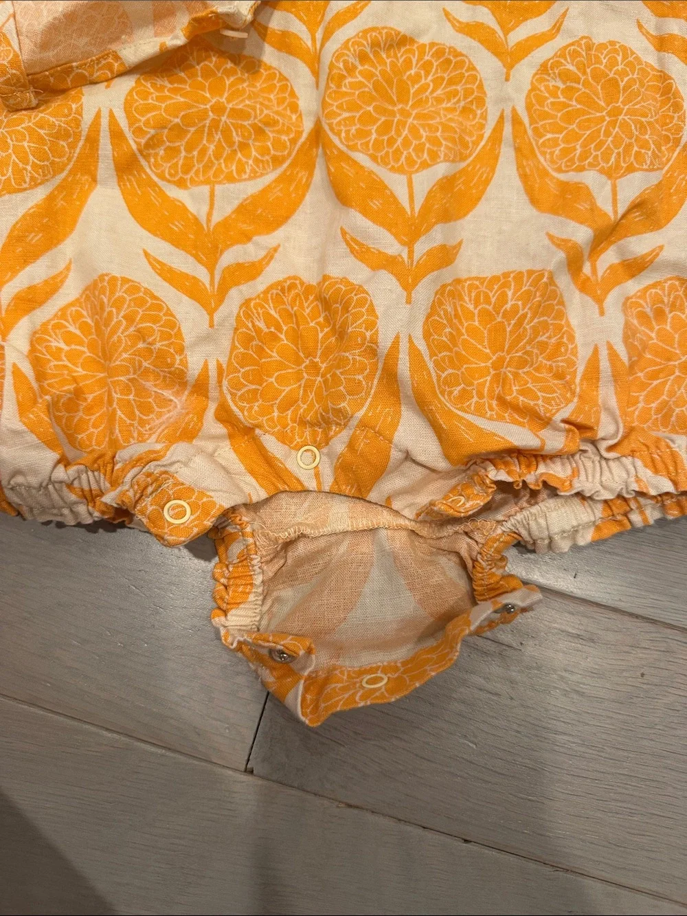 Tea Collection Orange and White Floral Baby Romper